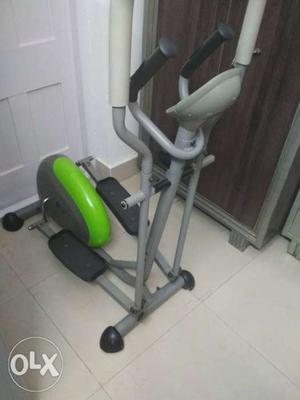 Green And Gray Elliptical Trainer