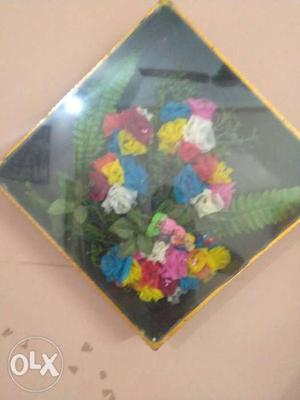 Hand making flower in arkandi nd framing hard