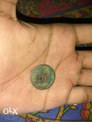 It's a copper coin 189years old. coin of 1/2
