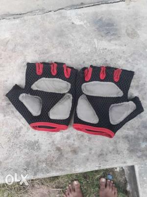 Pair Of Grey-and-black Fingerless Gloves