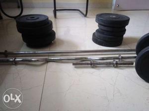 Proline brand 51 kg weight..two dumbell bar..one