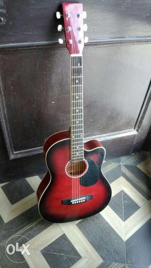 Red And Black Cut-away Acoustic Guitar