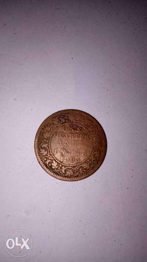 Round Copper-colored 1 Quarter Anna British Indian Coin