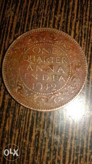 Round  Copper-colored Indian Quarter Anna Coin