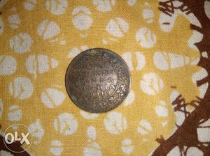 Round Silver-colored Anna Indian Coin