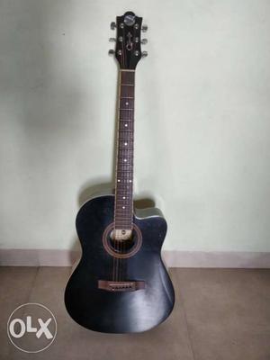 Three year old acoustic guitar.. Size - medium..