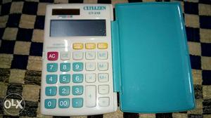 White And Blue Digital Calculator