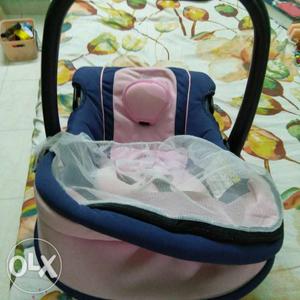 A mee-mee car seat for younger kids. Hardly used!