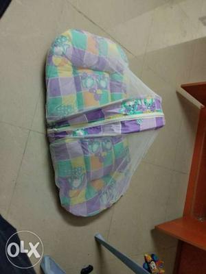 Baby bed, unused condition,with mosquito net