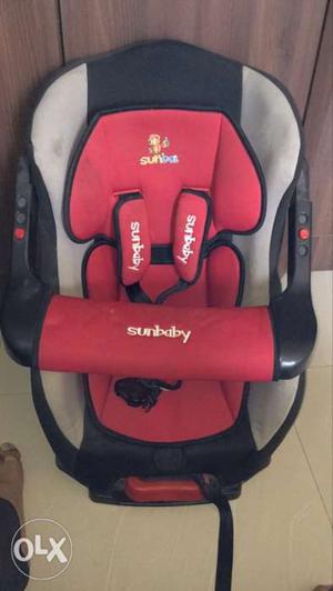 Baby's Red And Gray Car Seat Carrier