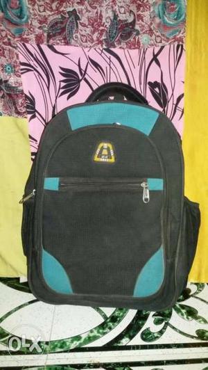 Blue n black backpack laptop compartment upto