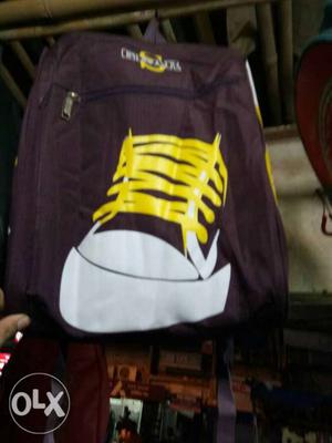 Maroon And Yellow Shoe-printed Backpack