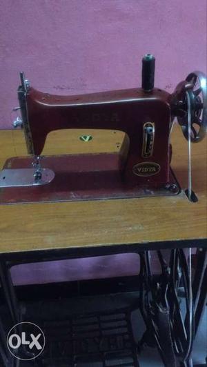 Maroon Treadle Sewing Machine