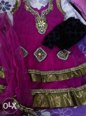 Net pink frock with black lagging and dupatta for