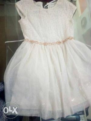 Off white net frock for age 6-8 yrs