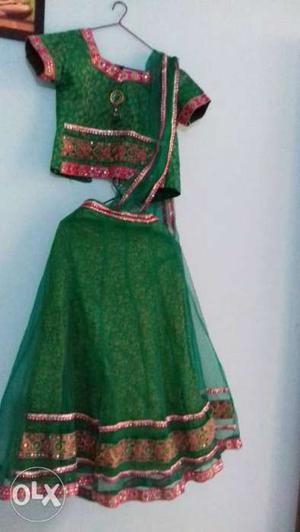 Party wear green colour lehenga nd choli size 34 -