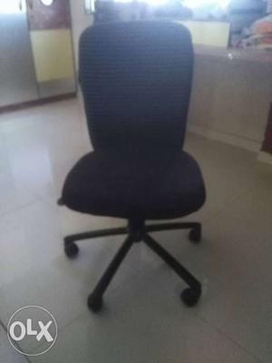 Revolving chair, black colour, very few used
