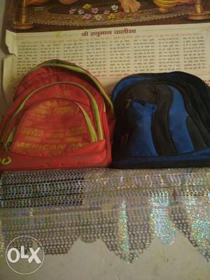 Two Red And Blue Backpacks