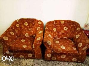 Two Red-and-white Floral Sofa Chairs