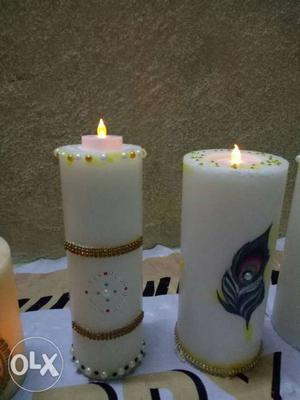 Two White Pillar Candles