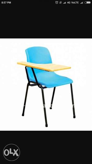 8 Chairs with writing pad in good condition.