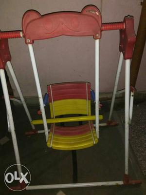 Baby's Red And White Swing Chair