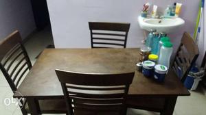 Dinning Table with 4 cushion chairs