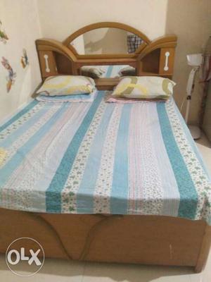 Double bed. 100% wood..5 ft width by 6 ft length.without