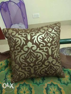 New cushion pair with cover, never used