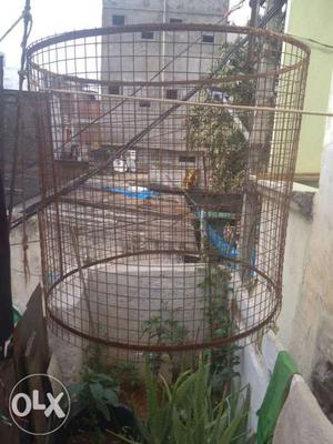 Cylindrical Brown Steel Cage