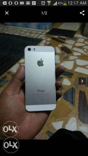 I phone 5s in 16gb in white color with charger
