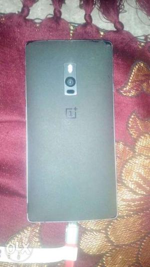 One plus 2 with box and orignal charger. Good