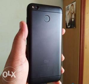 Redmi 4- 32 gb, black clr 6 month old, without