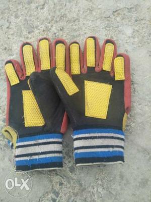 Pair Of Black-and-yellow Hand Gloves