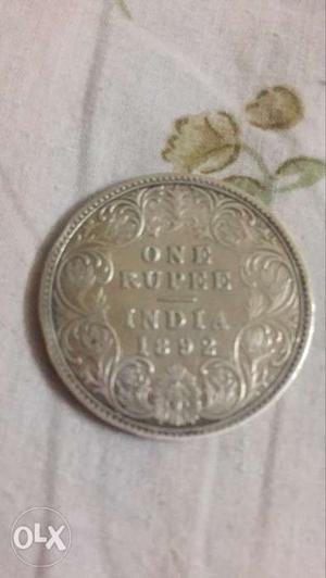 Round Pure silver coin 1 India Rupee.