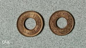 Two Round Copper-colored 1 Indian Pice Coins