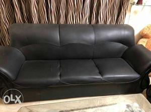 1 year old 5 seater leather sofa set with center table.