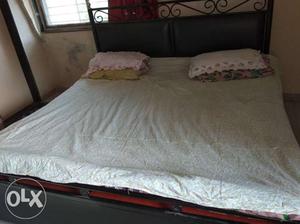 Black wroughtiron bed set for two in excellent