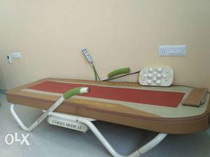 Brown And Red Hospital Bed