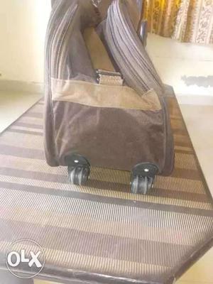 Brown Wheeled Luggage