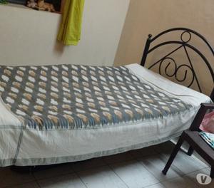 Gently used single iron cot at Rs ftx3ft) with 2 bed