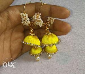 Pair Of Yellow Earrings With Clear Gemstones