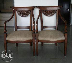 Pair of solid teak wood chairs