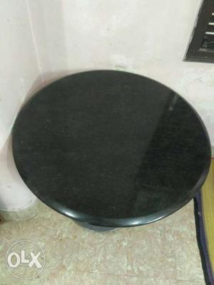 Round black fully polished granite table