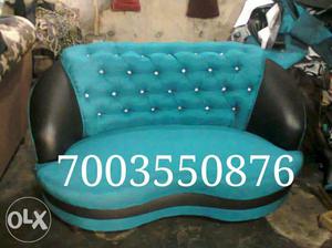Tufted Green And Black Leather And Fabric Cuddle Chair