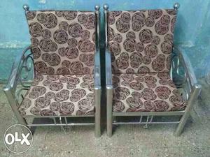 Two Silver Metal Padded Armchairs