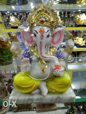 White, Yellow, Purple, And Pink Ganesha Hindu God Ceramic