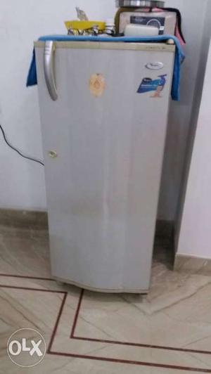 White coloured fridge for sale.