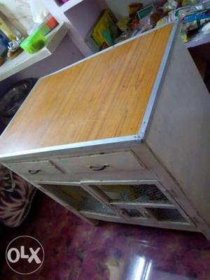 Wooden table with bird cage and drawer