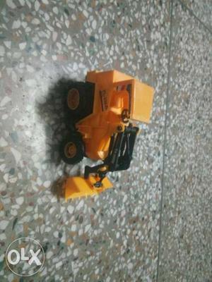 Yellow And Black Front-loader Plastic Toy